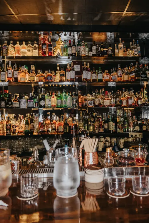 The back bar, lined with bottles